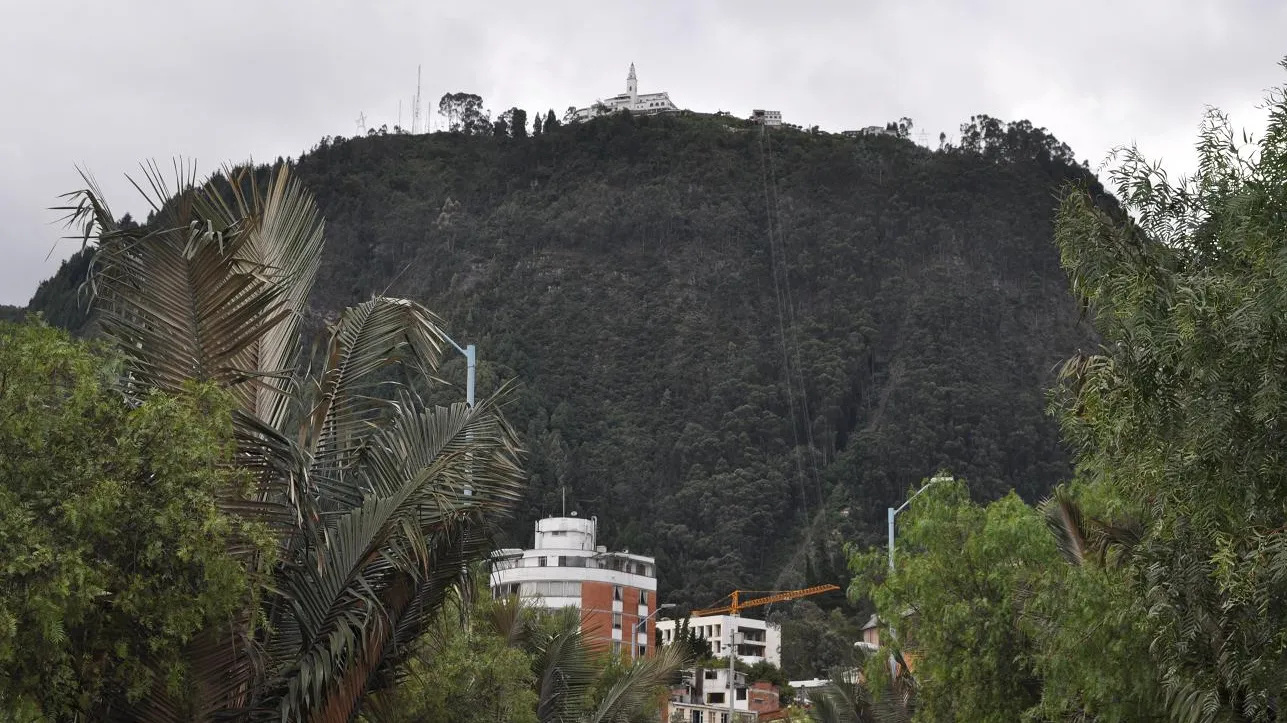 Monserrate hill in Bogotá, with its white church at the summit, seen from the city below